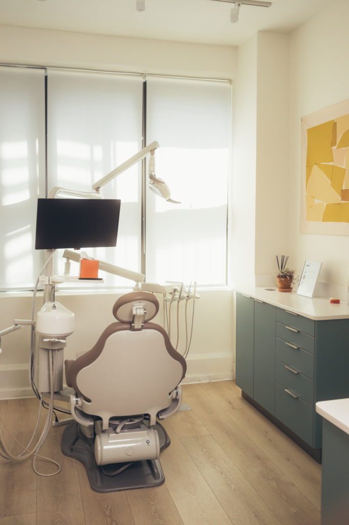 Dental chair and equipment at SMILELOUNGE in Brooklyn, NY with natural light